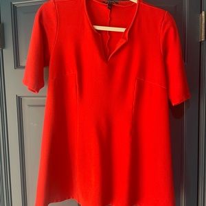 Isabella oliver size 4 (US size 10) orange maternity shirt. Expensive brand. EUC
